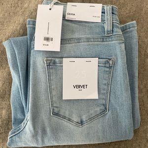 Light blue wide leg Jean with stretch and button fly detail